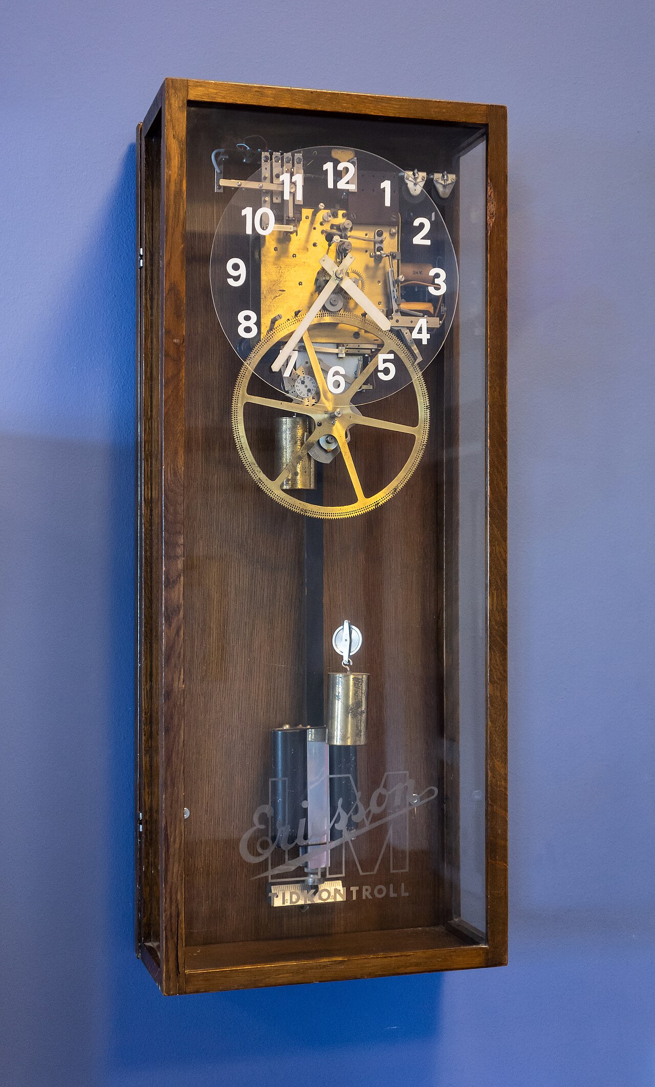 Illustrative mechanical punch clock